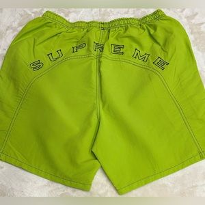 Lime green supreme swim trunks